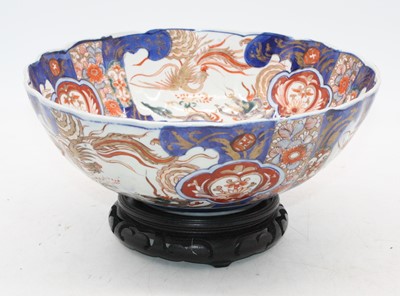 Lot 186 - A Japanese export porcelain bowl, decorated...