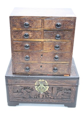 Lot 188 - An oak table-top chest, containing an...