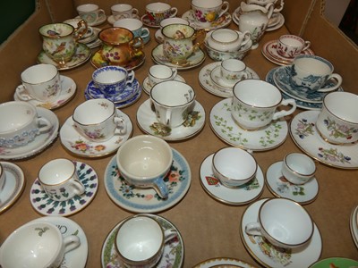 Lot 89 - A collection of miniature teacups and saucers...