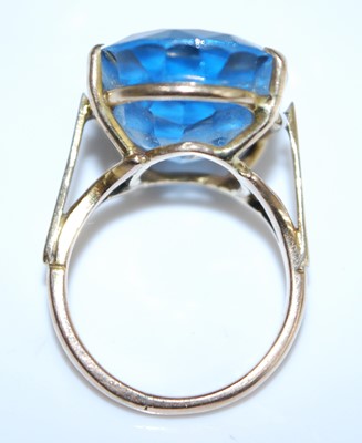 Lot 2541 - A 9ct gold blue topaz dress ring, the oval...