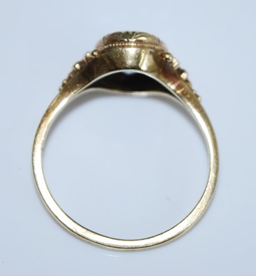 Lot 2550 - A yellow metal aquamarine dress ring, having...