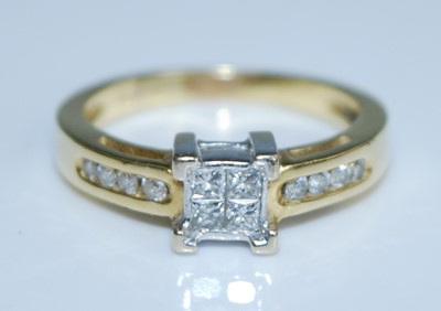 Lot 2559 - A yellow and white metal diamond quatrefoil...