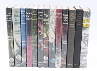 Lot 570 - Jules Verne: a collection of volumes being...