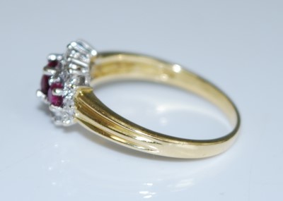Lot 2568 - An 18ct yellow and white gold, ruby and...