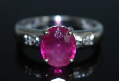 Lot 2577 - An 18ct white gold, ruby and diamond ring,...