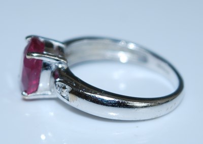 Lot 2577 - An 18ct white gold, ruby and diamond ring,...