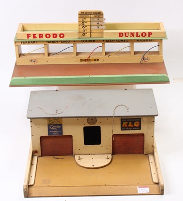 Lot 1919 - A vintage Triang wooden garage comprising of...