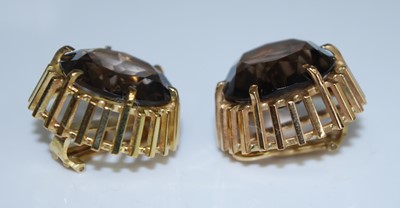 Lot 2591 - A pair of yellow metal smokey quartz earrings...