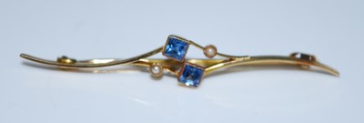 Lot 2594 - A yellow metal sapphire and seed pearl bar...