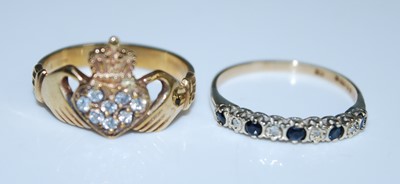 Lot 2596 - Two 9ct yellow gold rings. A 9ct yellow gold...