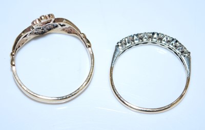 Lot 2596 - Two 9ct yellow gold rings. A 9ct yellow gold...