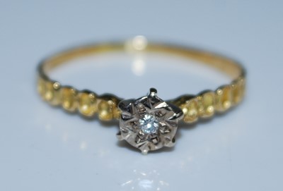 Lot 2598 - A yellow and white metal diamond single stone...