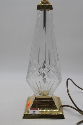 Lot 10 - A modern cut glass table lamp on brass base...