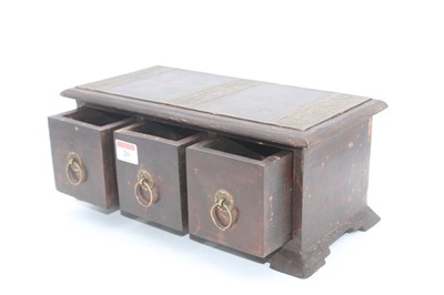 Lot 20 - A hardwood and brass mounted three drawer...
