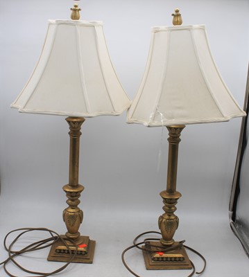 Lot 30 - A pair of French style gilt table lamps with...