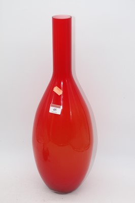 Lot 45 - A large orange tinted art glass bottle vase,...
