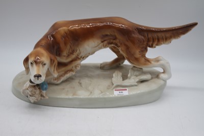 Lot 66 - A large Royal Dux figure of a gun dog and duck...