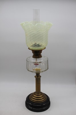 Lot 123 - A late Victorian brass pedestal oil lamp...