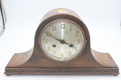Lot 151 - A 1920s oak cased mantel clock