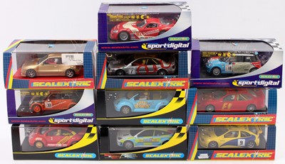 Lot 1935 - 10 boxed Scalextric slot cars including No....