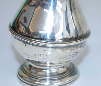 Lot 2123 - A George II silver pepperette, of belted...