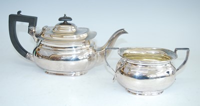 Lot 2170 - A mid-20th century silver teapot and sugar duo,...