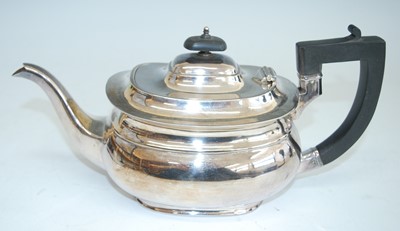 Lot 2170 - A mid-20th century silver teapot and sugar duo,...