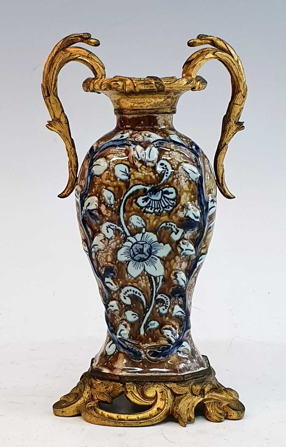Lot 2048 - An 18th century tin glazed earthenware vase,...