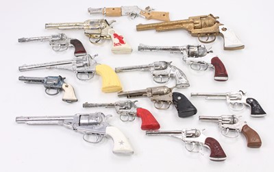 Lot 1956 - A collection of loose children's cap guns and...