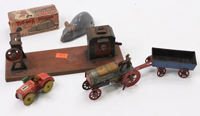 Lot 1992 - A collection of tinplate and clockwork models...