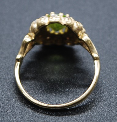 Lot 2604 - A 9ct yellow gold, peridot and pearl oval...