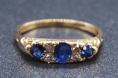 Lot 2607 - An 18ct yellow gold, sapphire and diamond...