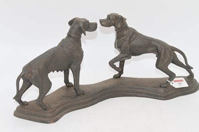 Lot 26 - A 20th century cast metal group of two dogs, h....