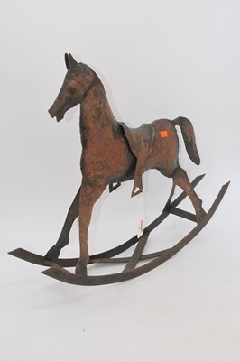 Lot 28 - A 20th century iron miniature rocking horse, h....