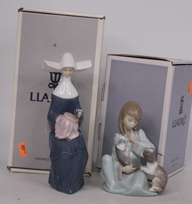 Lot 37 - A Lladro porcelain figure of a seated nun,...