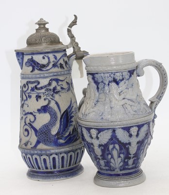 Lot 52 - Two Rhineland stoneware jugs, each decorated...
