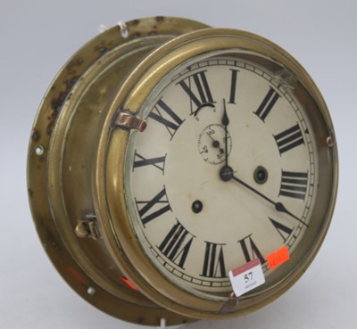 Lot 57 - A brass ship's clock, the dial showing Roman...