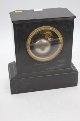 Lot 61 - A Victorian black slate mantel clock, the...