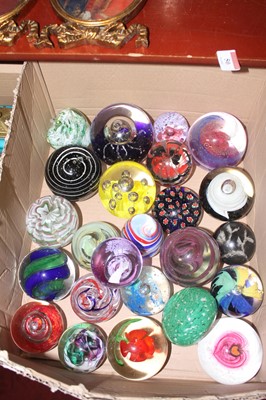 Lot 81 - A collection of glass paperweights, to include...