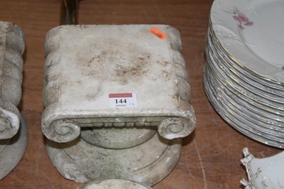 Lot 144 - A pair of carved marble ionic capitals and...