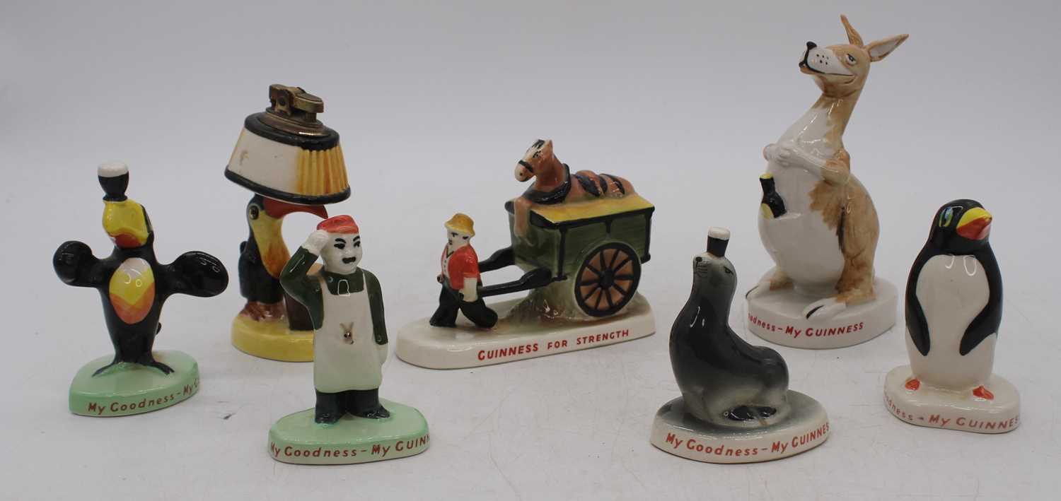 Lot 206 - A collection of Guinness advertising figures,...
