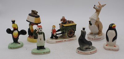 Lot 206 - A collection of Guinness advertising figures,...