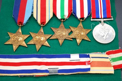 Lot 196 - A collection of five WW II medals to include...