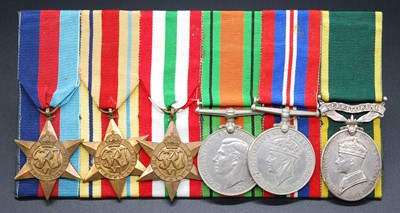 Lot 181 - A group of six medals to include 1939-1945...