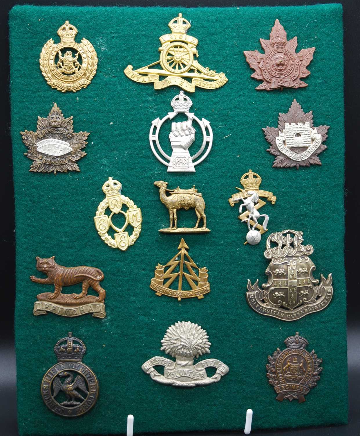 Lot 63 - A collection of cap badges mainly being...