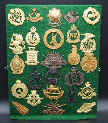 Lot 72 - A collection of cap badges and insignia,...
