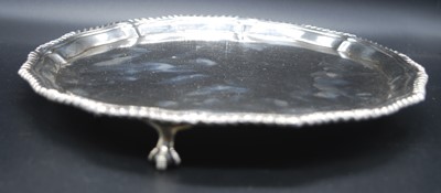 Lot 2167 - A George V silver card waiter, of shaped...