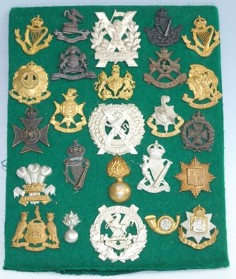 Lot 70 - A collection of British Army cap badges and...