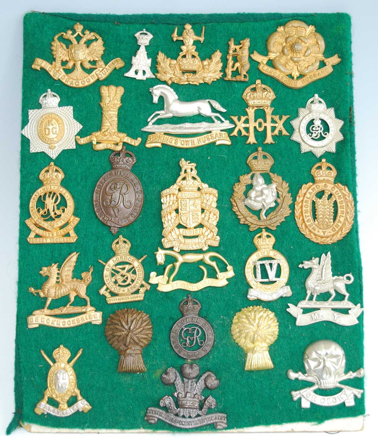 Lot 71 - A collection of British Army cap badges and...