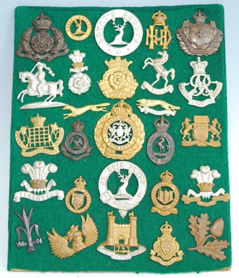 Lot 71 - A collection of British Army cap badges and...